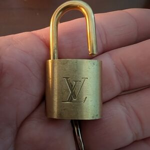 Gold Louis Vuitton Padlock Keychain